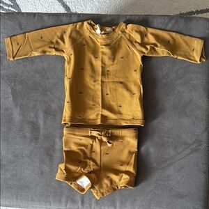 Quincy Mae Newborn swimsuit, material is spf 50